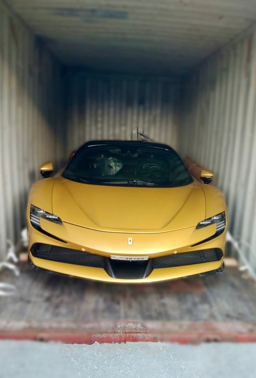 Luxury car being loaded into a container for CPD shipping from Dubai to India